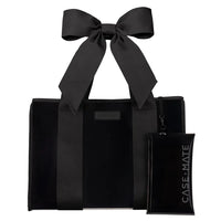 The Midnight Black Bow Jelly Tote Bag features wide handles, a large matching bow, and a detachable phone pouch—a chic CASE•MATE travel accessory.