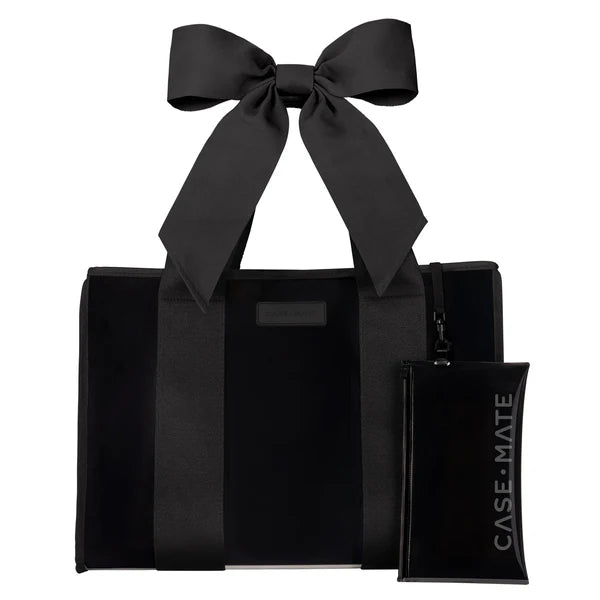 The Midnight Black Bow Jelly Tote Bag features wide handles, a large matching bow, and a detachable phone pouch—a chic CASE•MATE travel accessory.